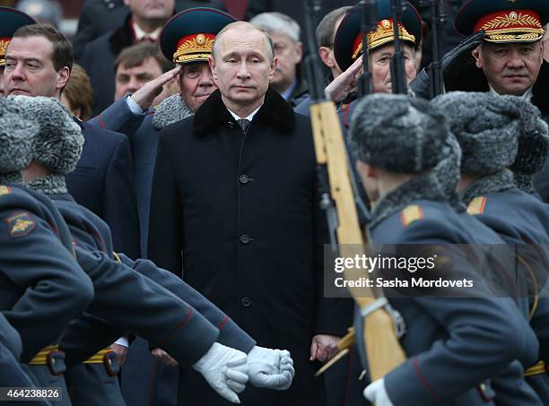 Russian President Vladimir Putin , Prime Minister Dmitry Medvedev and Defence Minister Sergei Shoigu attend a wreath laying ceremony at the tomb of...