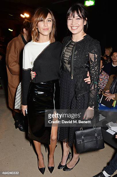 Alexa Chung and Daisy Lowe attend the Erdem show during London Fashion Week Fall/Winter 2015/16 at Old Selfridges Hotel on February 23, 2015 in...