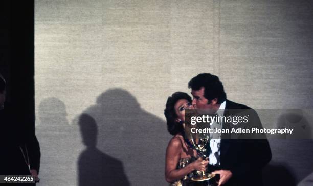 Actress, singer, and dancer Rita Moreno poses with James Garner after winning Best Lead Actress for a Single Appearance in a Drama or Comedy Series:...