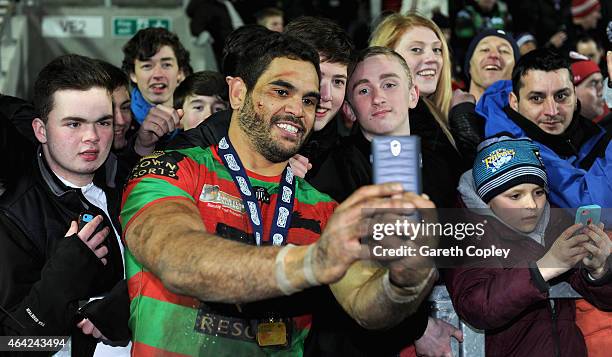 Greg Inglis of South Sydney Rabbitohs poses for a selfie after winning the World Club Series match between St Helens and South Sydney Rabbitohs at...