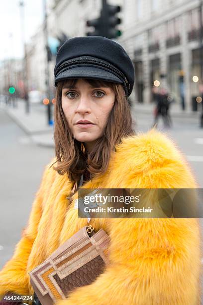Photographer and Boutique owner Sara Reverberi wears vintage hat and jacket, Raoul top and a Barbara Bonner bag on day 3 of London Collections: Women...