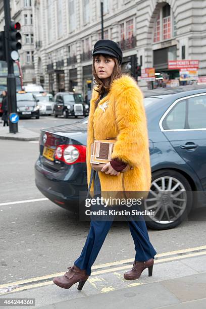 Photographer and Boutique owner Sara Reverberi wears vintage hat and jacket, Porta Mento shoes, JWo trousers, Raoul top and a Barbara Bonner bag on...