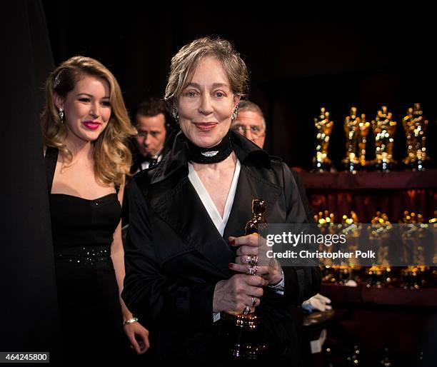 Costume designer Milena Canonero, winner of the Best Costume Design Award for 'The Grand Budapest Hotel' poses backstage during the 87th Annual...