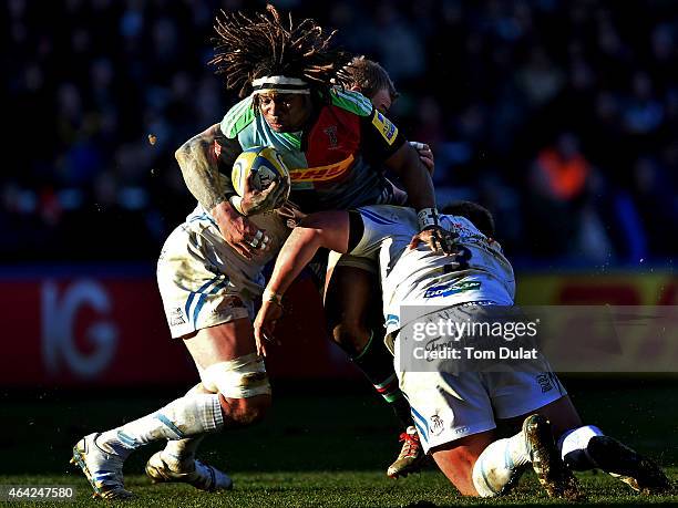 Marland Yarde of Harlequins is tackled during the Aviva Premiership match between Harlequins and Exeter Chiefs at the Twickenham Stoop on February...