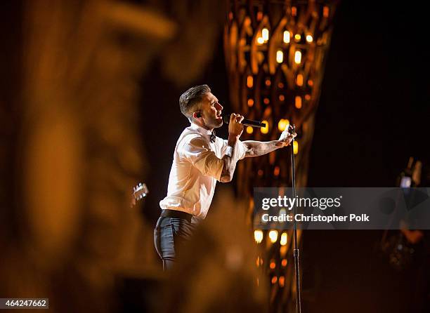 Singer Adam Levine of Maroon 5 performs 'Lost Stars' from 'Begin Again' onstage during the The 87th Annual Academy Awards at Hollywood & Highland...