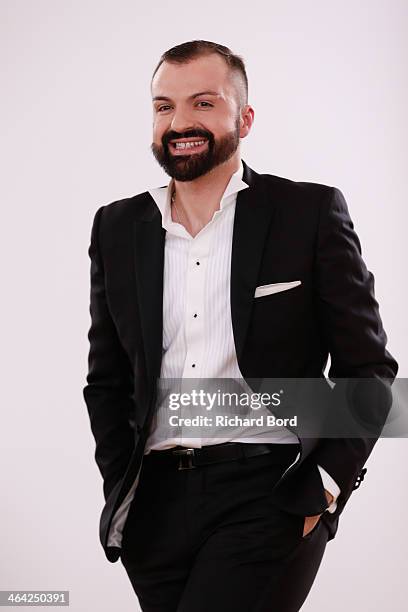 Designer Julien Fournie aknowledges the public after his show as part of Paris Fashion Week Haute Couture Spring/Summer 2014 on January 21, 2014 in...