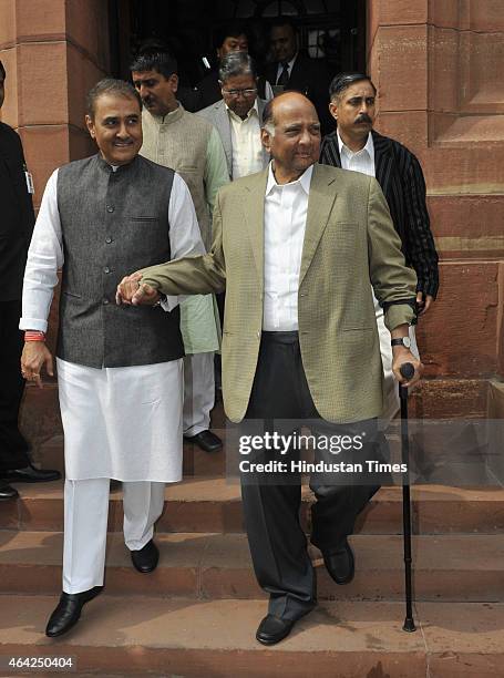 Chief Sharad Pawar with NCP leader Praful Patel come out after the Presidential address of both houses on the first day of Budget Session at...