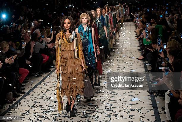 Model walks the runway at the Burberry Prorsum show during London Fashion Week Fall/Winter 2015/16 at perk's Field on February 23, 2015 in London,...