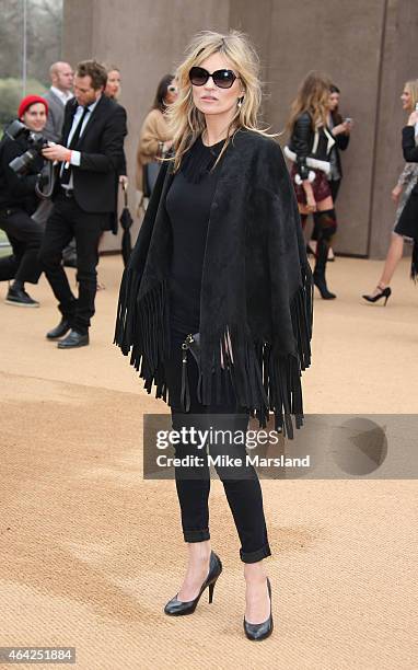 Kate Moss attends the Burberry Prosum show during London Fashion Week Fall/Winter 2015/16 at perk's Field on February 23, 2015 in London, England.