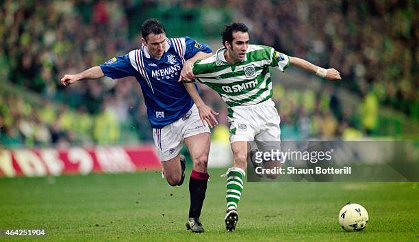 Rangers player Ian Ferguson challenges Paolo Di Canio of Celtic during an Old Firm game at Parkhead on March 16, 1997 in Glasgow, Scotland.