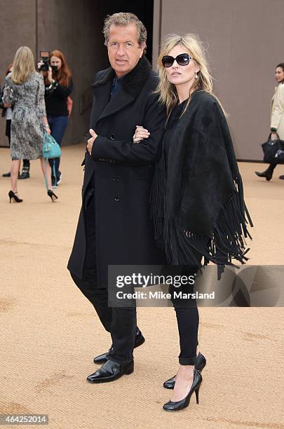 Mario Testino and Kate Moss attend attend the Burberry Prosum show during London Fashion Week Fall/Winter 2015/16 at perk's Field on February 23,...