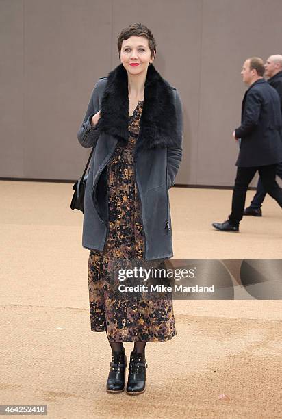 Maggie Gyllenhaal attends the Burberry Prosum show during London Fashion Week Fall/Winter 2015/16 at perk's Field on February 23, 2015 in London,...