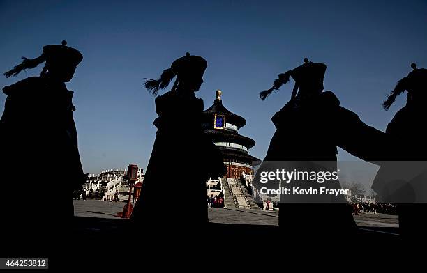 Chinese performers re-enact a Qing Dynasty ceremony at the Temple of Heaven during Spring Festival celebrations on February 23, 2015 in Beijing,...