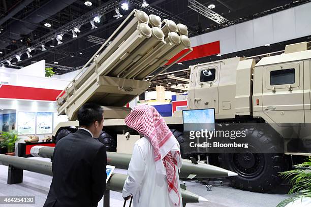 Multiple rocket launch system sits on display in the China North Industries Group Corp. Pavilion at the International Defence Exhibition in Abu...