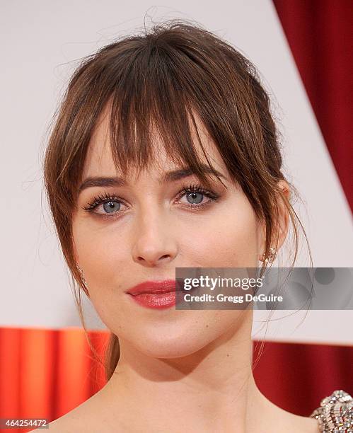 Actress Dakota Johnson arrives at the 87th Annual Academy Awards at Hollywood & Highland Center on February 22, 2015 in Hollywood, California.