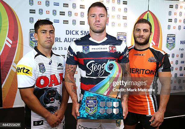 Jamie Soward of the Panthers, Shaun Kenny-Dowall of the Roosters and Robbie Farah of Wests Tiger pose in their new club playing jerseys along with...