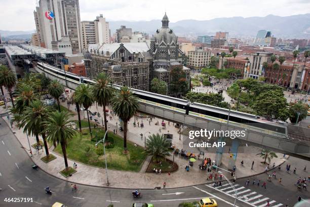 By Ariela Navarro Picture of the metro leaving a station in Medellin, Antioquia department, Colombia, on January 5, 2014. In 2013 Medellin was chosen...