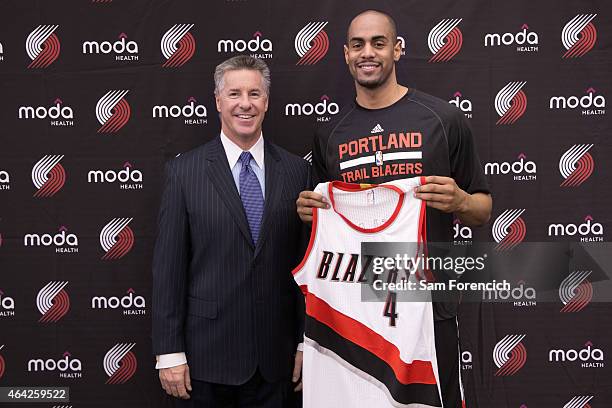 Arron Afflalo of the Portland Trail Blazers is introduced to the media by General Manager Neil Olshey on February 21, 2015 at the Trail Blazer...