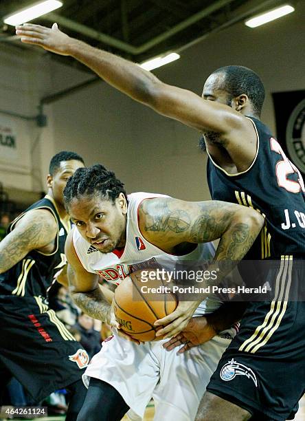 Maine Red Claws Rodney McGruder pushes through Erie Joe Crawford during first half action vs. Erie Bayhawks Sunday, February 22, 2015 at the Portland...
