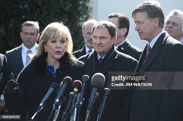 Oklahoma Governor Mary Fallin speaks with Colorado Governor John Hickenlooper and Utah Governor Gary Herbert after a meeting of the National...