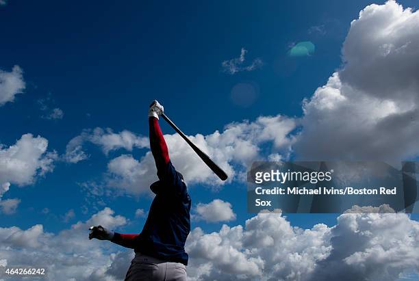 Rusney Castillo of the Boston Red Sox warms up before taking batting practice at Fenway South on February 23, 2015 in Fort Myers, Florida.