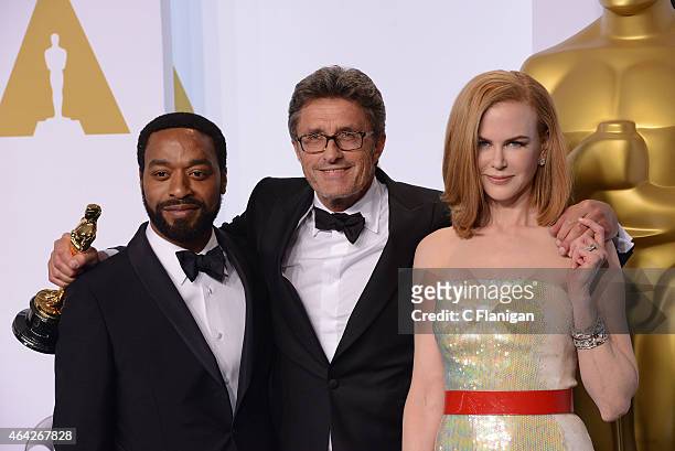 Actor Chiwetel Ejiofor, filmmaker Pawel Pawlikowski and actress Nicole Kidman pose in the press room during the 87th Annual Academy Awards at Loews...