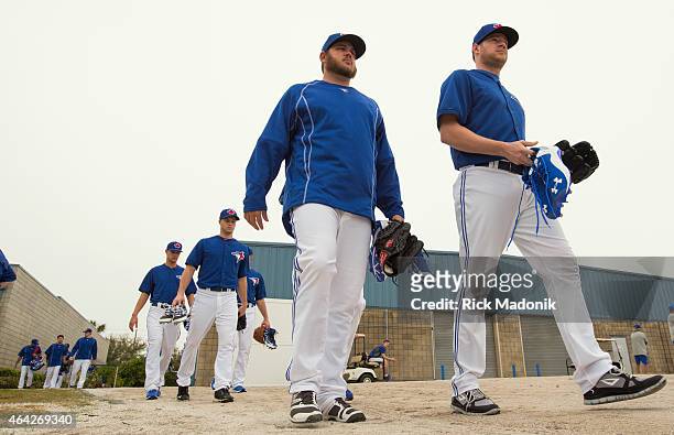 Pitchers and catchers arrive at the practice facility to open the Toronto Blue Jays 2015 spring training session. Photos from February 23, 2015.