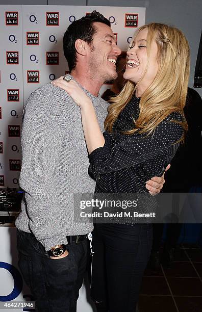 Luke Evans and Laura Whitmore attend War Child & O2 BRIT Awards Show at O2 Shepherd's Bush Empire on February 23, 2015 in London, England.