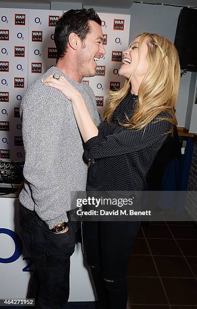 Luke Evans and Laura Whitmore attend War Child & O2 BRIT Awards Show at O2 Shepherd's Bush Empire on February 23, 2015 in London, England.