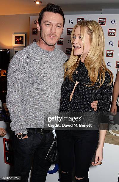 Luke Evans and Laura Whitmore attend War Child & O2 BRIT Awards Show at O2 Shepherd's Bush Empire on February 23, 2015 in London, England.