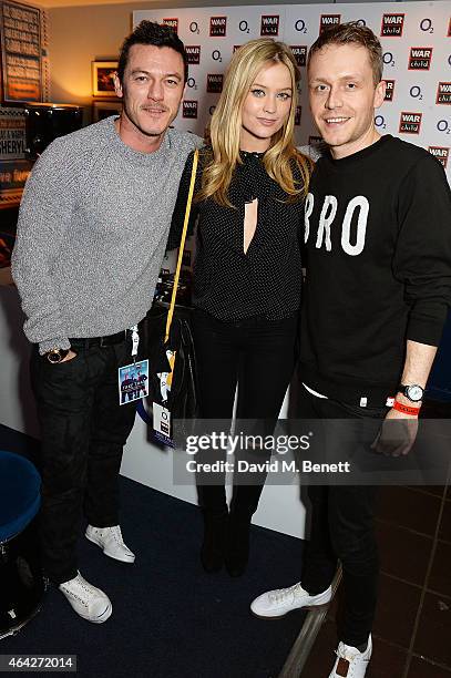 Luke Evans; Laura Whitmore and Mr Hudson attend War Child & O2 BRIT Awards Show at O2 Shepherd's Bush Empire on February 23, 2015 in London, England.