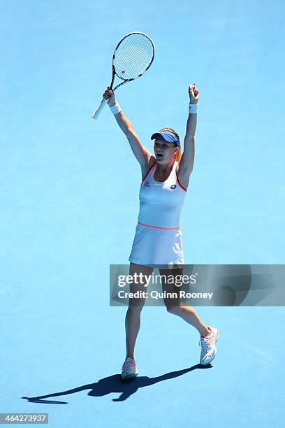 Agnieszka Radwanska of Poland celebrates winning her quarterfinal match against Victoria Azarenka of Belarus during day 10 of the 2014 Australian...