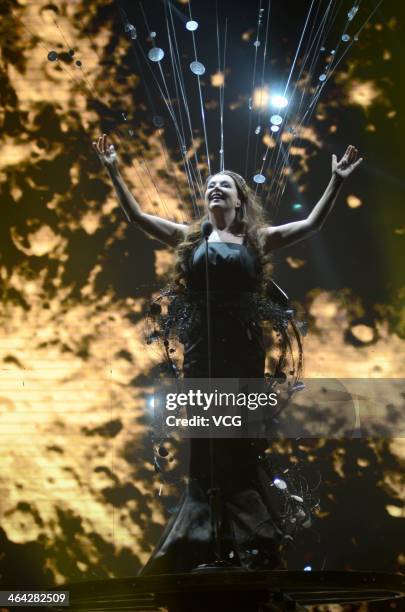 English singer Sarah Brightman performs on stage during her concert at Shanghai Grand Stage on January 21, 2014 in Shanghai, China.