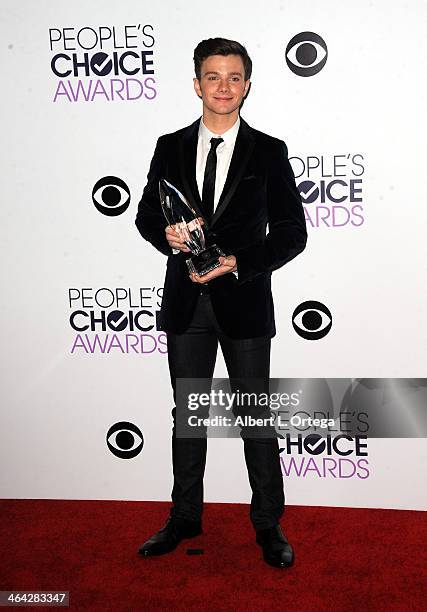 Actor Chris Colfer attends The 40th Annual People's Choice Awards - Press Room held at Nokia Theatre L.A. Live on January 8, 2014 in Los Angeles,...