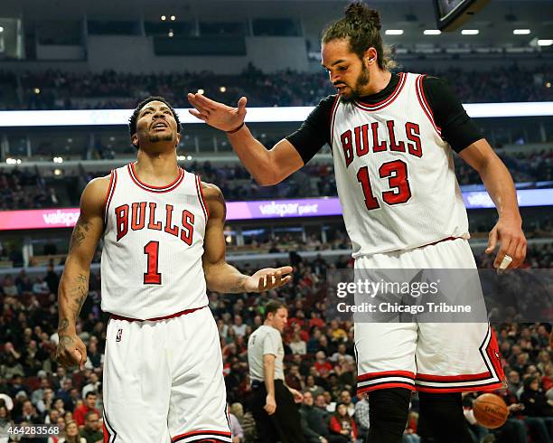 Chicago Bulls guard Derrick Rose and Chicago Bulls center Joakim Noah , after Rose was fouled, during the first half on Monday, Feb. 23 at the United...