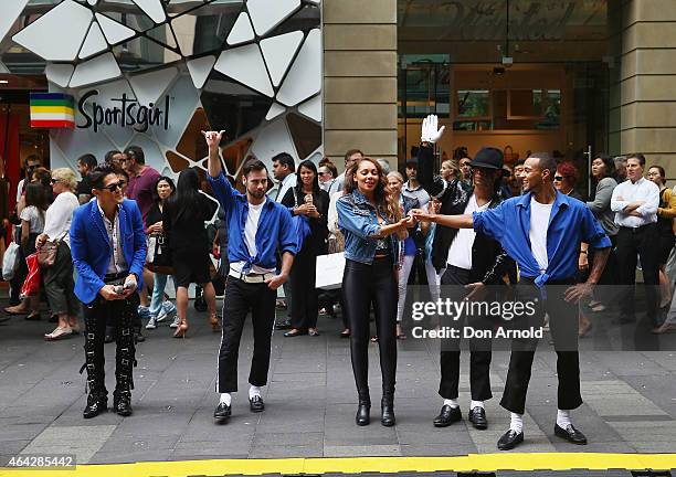 MiG Ayesa looks on as Joe Drum,Prinnie Stevens, Sean Christopher and Simeon Henri finish their song and dance performance during a Michael Jackson...