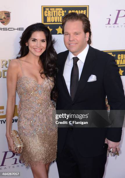 Actress Joyce Giraud and husband film producer and CEO of Infinity Media Michael Ohoven arrive at the 19th Annual Critics' Choice Movie Awards at...