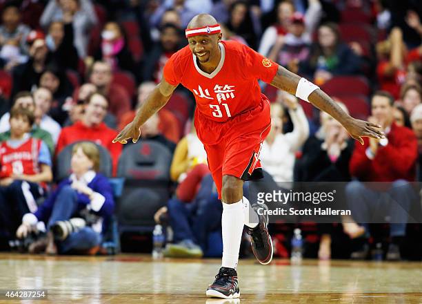 Jason Terry of the Houston Rockets celebrates a three-point shot during their game against the Minnesota Timberwolves at the Toyota Center on...