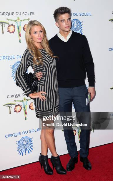 Personality Paris Hilton and model River Viiperi attend opening night of Cirque du Soleil's "Totem" at the Santa Monica Pier on January 21, 2014 in...