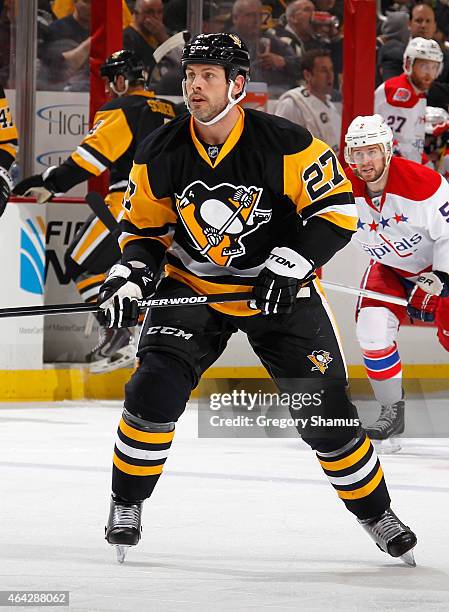 Craig Adams of the Pittsburgh Penguins skates against the Washington Capitals at Consol Energy Center on February 17, 2015 in Pittsburgh,...