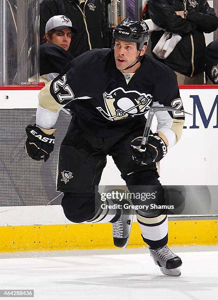 Craig Adams of the Pittsburgh Penguins skates against the Columbus Blue Jackets at Consol Energy Center on February 19, 2015 in Pittsburgh,...