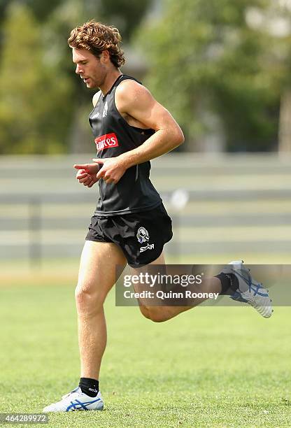 Matt Scharenberg of the Magpies does sprints during a Collingwood Magpies AFL training session at Olympic Park on February 24, 2015 in Melbourne,...