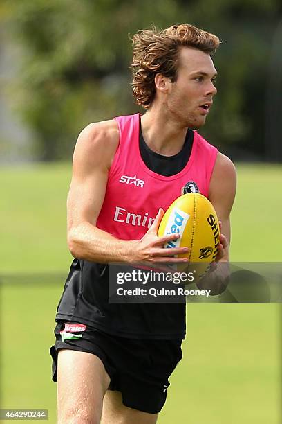 Matt Scharenberg of the Magpies looks to pass the ball during a Collingwood Magpies AFL training session at Olympic Park on February 24, 2015 in...