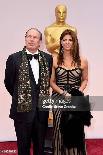 Composer Hans Zimmer and Dina De Luca attend the 87th Annual Academy Awards at Hollywood & Highland Center on February 22, 2015 in Hollywood,...