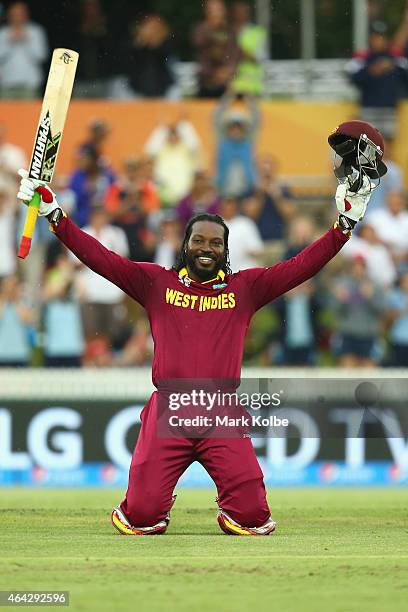 Chris Gayle of West Indies celebrates his double century during the 2015 ICC Cricket World Cup match between the West Indies and Zimbabwe at Manuka...