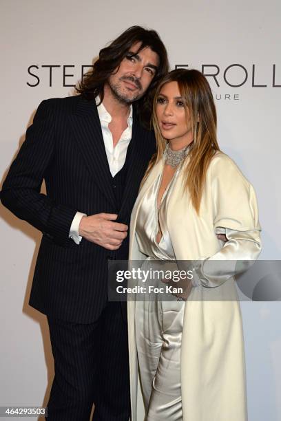 Stephane Rolland and Kim Kardashian attend the Stephane Rolland show during Paris Fashion Week - Haute Couture S/S 2014 at Theatre National de...