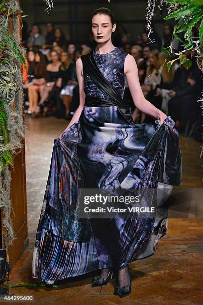 Model walks the runway at the GILES show during London Fashion Week Fall/Winter 2015/16 at Central Saint Martins on February 23, 2015 in London,...