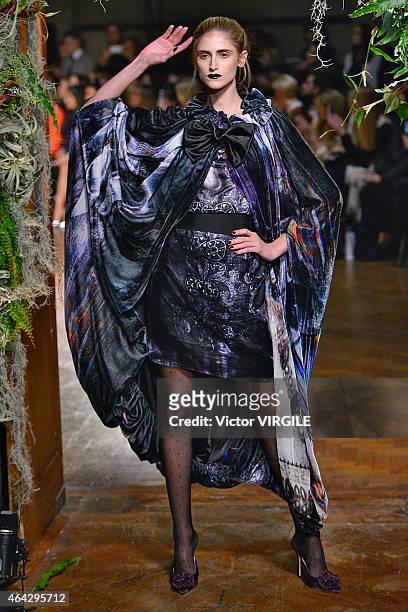 Model walks the runway at the GILES show during London Fashion Week Fall/Winter 2015/16 at Central Saint Martins on February 23, 2015 in London,...
