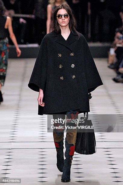 Model walks the runway at the Burberry Prosum show during London Fashion Week Fall/Winter 2015/16 at perk's Field on February 23, 2015 in London,...