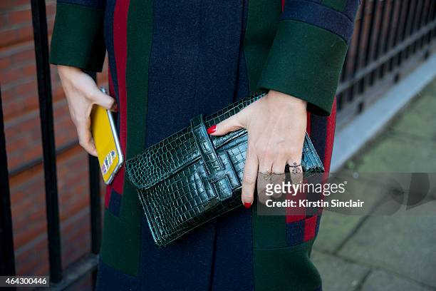 Jewellery and clothing designer Natasha Zinko wears a Tom Browney coat, Hermes bag, and Natasha Zinko jewellery on February 23, 2015 in London,...